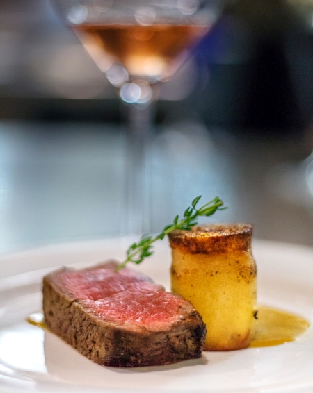 Filet of Beef, Butter Pan Seared, Gorgonzola Sauce, Fondant Potatoes and Roasted Cauliflower