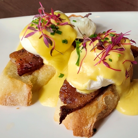 Eggs Benedict with Candied Smoked Applewood Bacon and Hollandaise