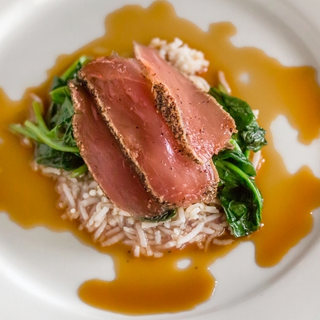 SIGNATURE YELLOWFIN TUNA, Black Pepper Crusted, Braised Spinach, Steamed Basmati Rice, Soy Ginger Sauce